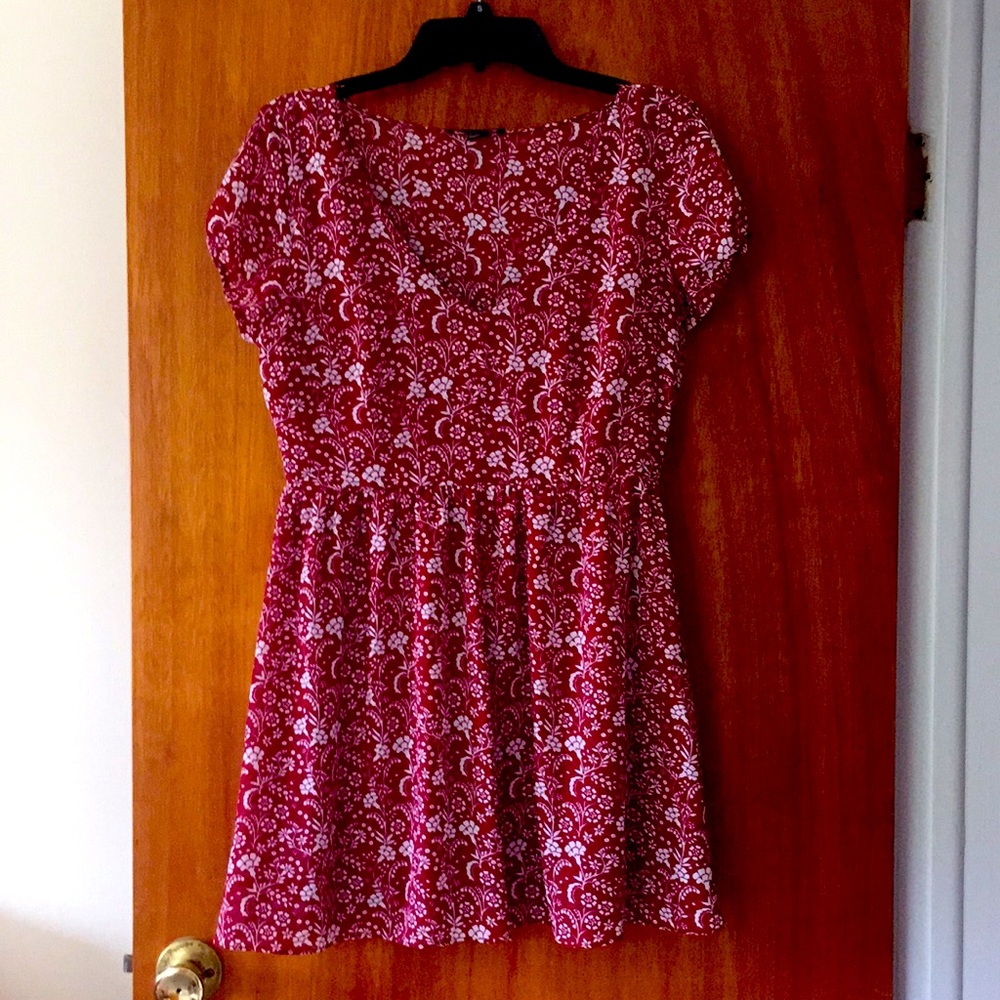 Red v-neck dress with white flower pattern